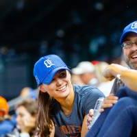 Sid view of people laughing at Comerica Park